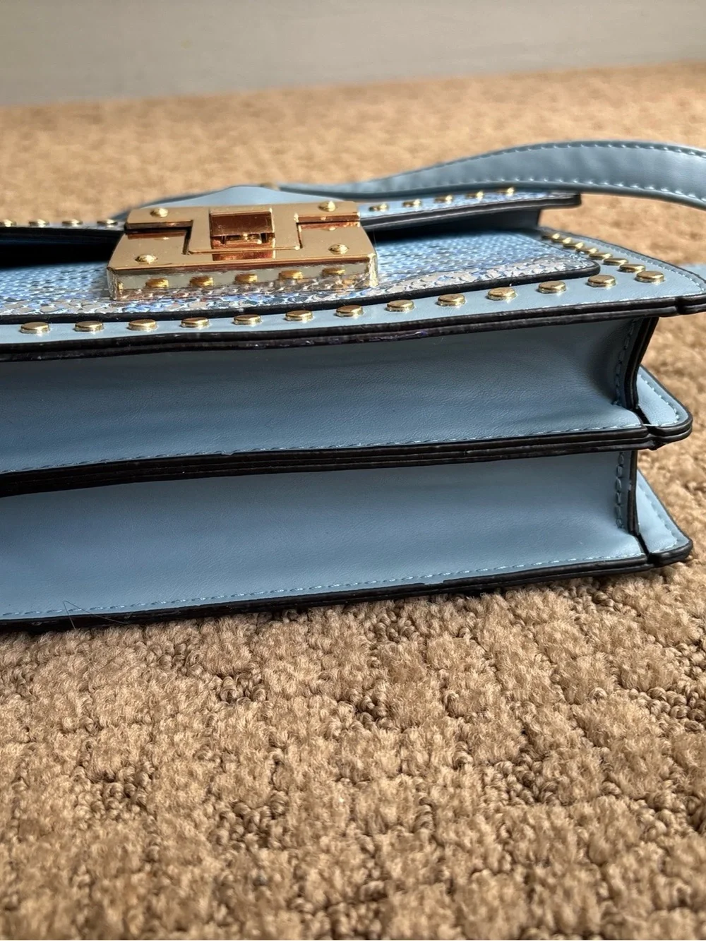 Faux snakeskin crossbody blue purse new with minor mark on bottom